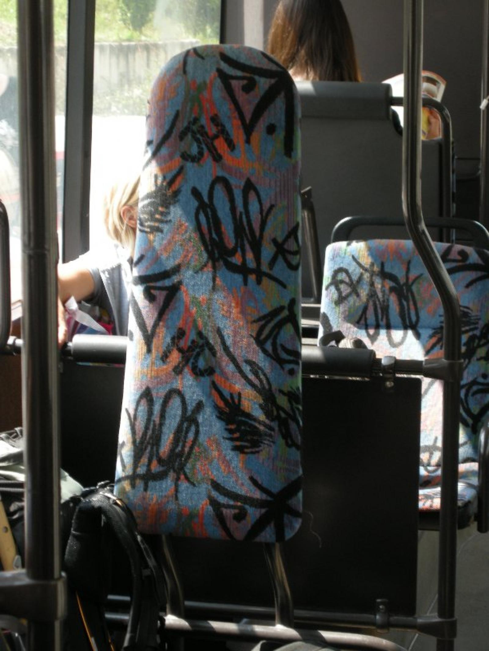 Bus seat cover with tagging built in