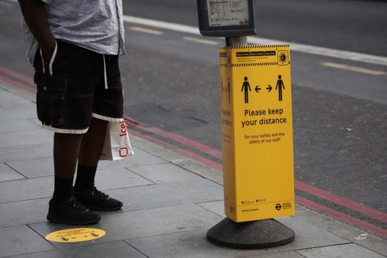 TfL keep your distance signage