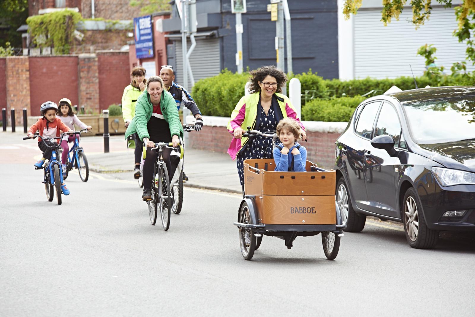 People cycling in Manchester