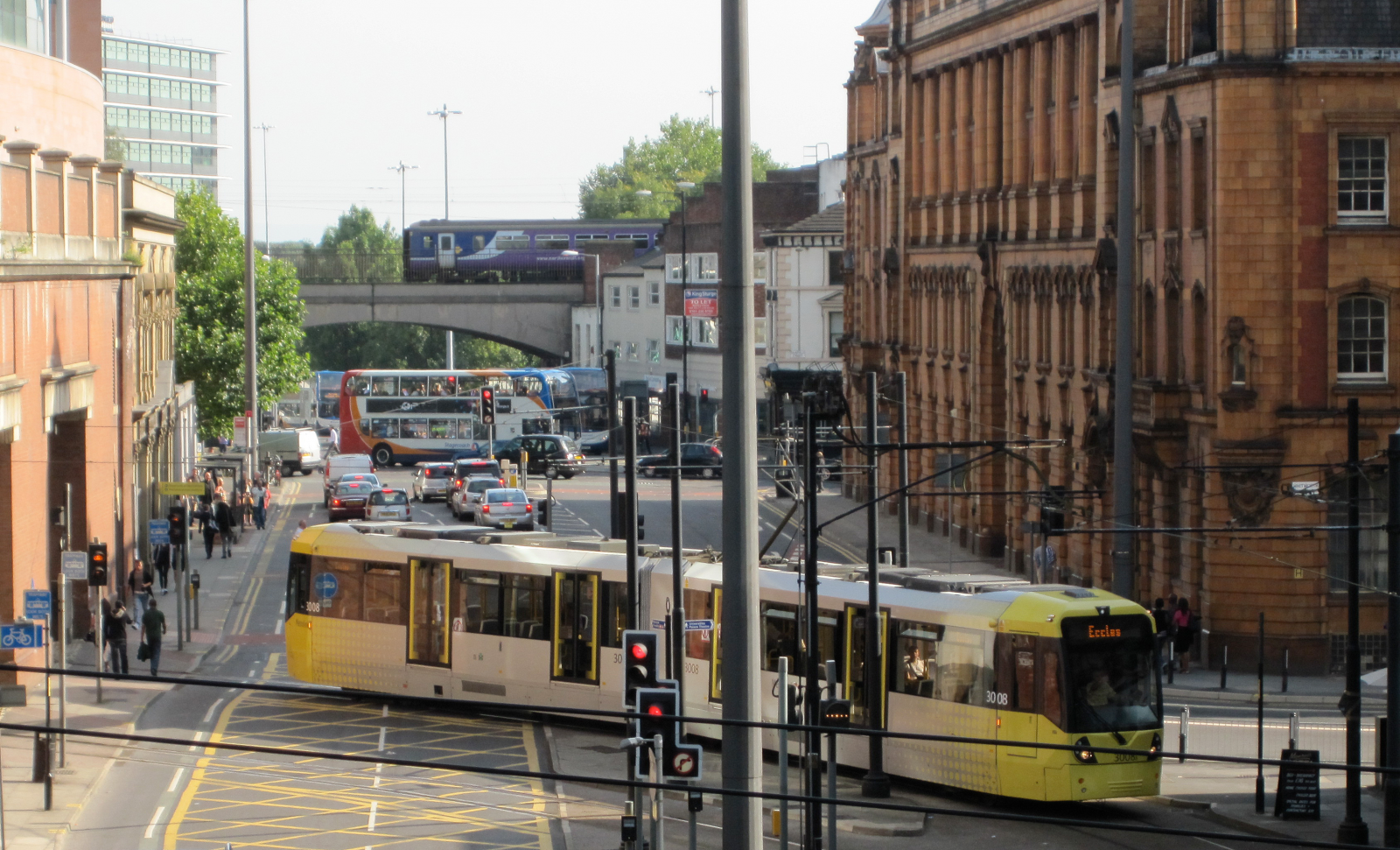 Tram, bus and train in Manchester