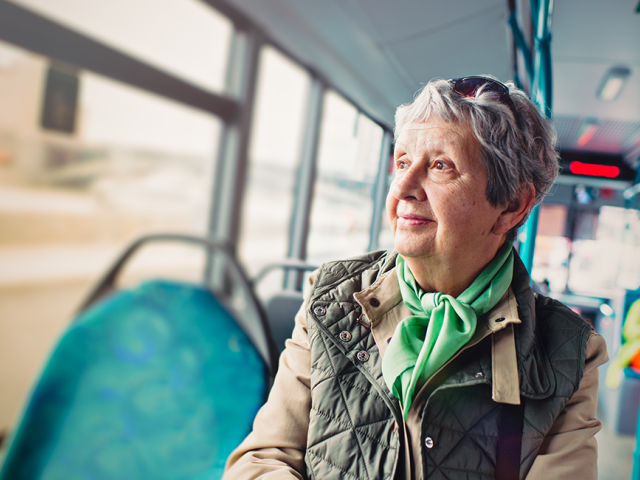 Elderly lady on a bus